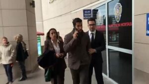 Beşiktaşlı futbolcu Necip Uysal suç duyurusunda bulunmak için adliyeye geldi